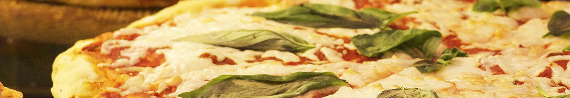 Eating Italian Pizza at Pino's Pizza & Italian restaurant in Emporia, VA.
